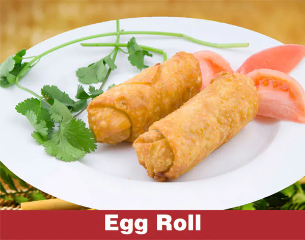Crispy fried egg rolls with cilantro garnish on a white plate at Great Wall, a Chinese Restaurant in Indianapolis