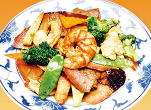 Mixed vegetable and meat stir-fry in brown sauce on a patterned plate at Great Wall, a Chinese Restaurant in Indianapolis